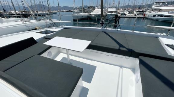 Comfortable lounge area on the Bali 4.2 Catamaran Bella II, perfect for relaxing with harbor views.