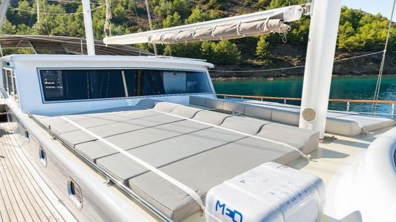 Spacious sunbathing areas on the 6-cabin gulet Koray Ege, for hire in Marmaris.