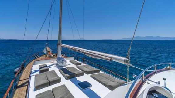 Enjoy the stunning view from the sun deck of Gulet Vamos 1 on the open sea.