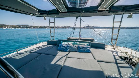 Enjoy the sun and sea views on the spacious sun deck of Catamaran Lucky Clover.