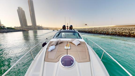 Pershing 5X White offers a luxurious yacht rental experience on Dubai's tranquil waters.