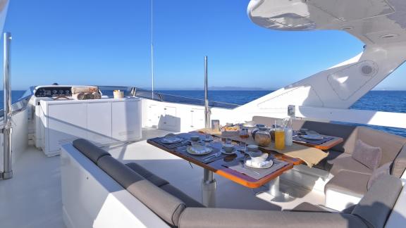 Exquisite outdoor breakfast aboard the luxurious 30-meter Motor Yacht Martina in Greece.