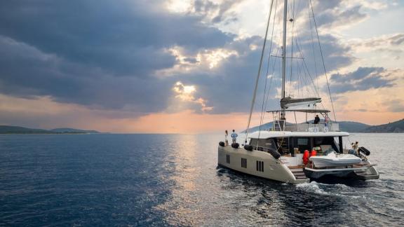 In Kastela Zara sails into the sunset with crew on board and tender secured at the aft.