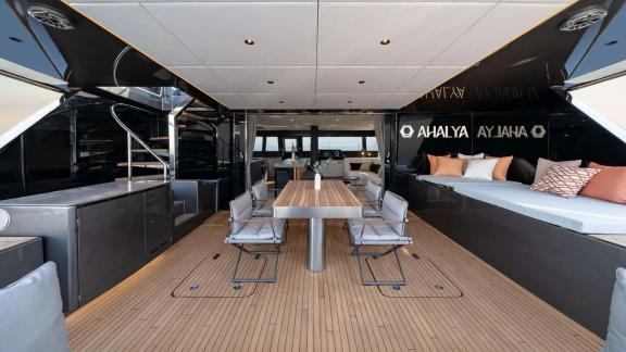 Ahalya charter Sunreef 60 catamaran features a luxurious dining area on the aft deck.