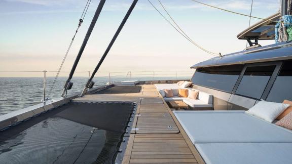 Ahalya charter Sunreef 60 catamaran features a spacious foredeck lounge with sea view.