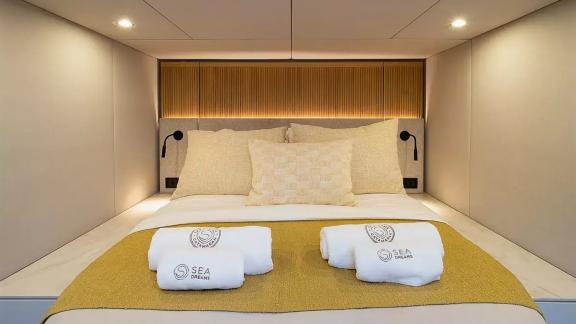 Guest cabin of the Sunreef 60 Sea Dreams catamaran in Split Marina, Croatia, offering peaceful accommodation at sea.