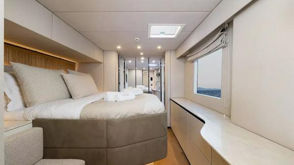 Master cabin of the Sunreef 60 Sea Dreams catamaran in Split Marina, Croatia, offering premium accommodation at sea.