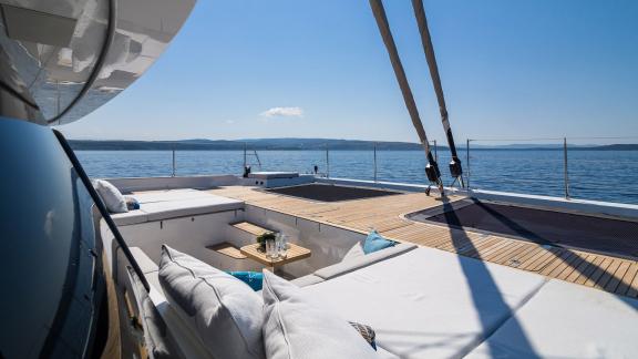 Relax on Sunreef 60 Vulpino’s cushioned deck in Kastela with stunning sea views.