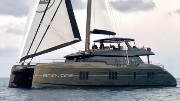 The Sunreef Catamaran Grayone sailing at sea with fully raised sails.