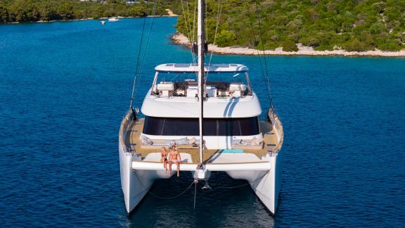 The chartered Sunreef 80 Honeybird offers a serene escape for couples in turquoise Šibenik waters.
