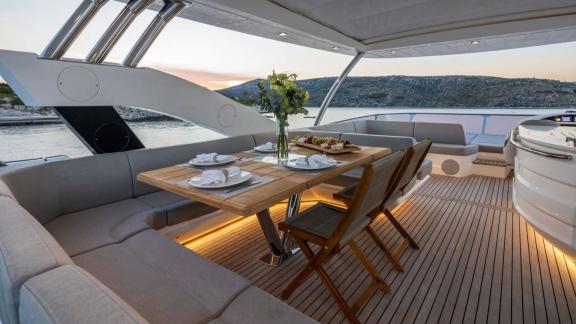 The Sunseeker 75 offers an elegant dining area on its upper deck overlooking the Split coastline.