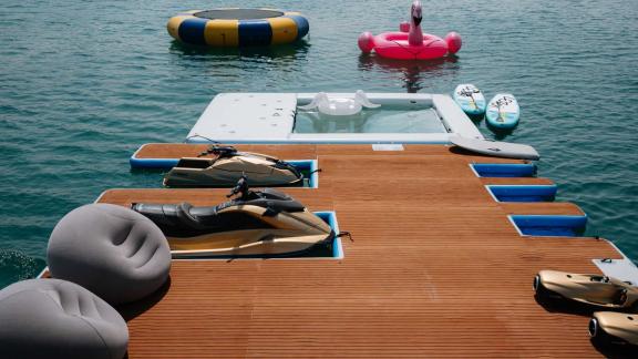 Enjoy jet skis, inflatable toys, and a pool experience with the luxury Ak Royalty yacht in Dubai.