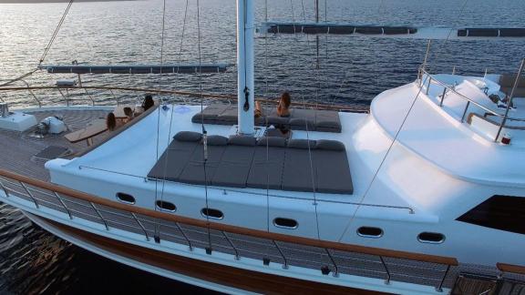 Upper deck of the luxurious 6-cabin gulet Şadiye Hanım in Marmaris at sunset.