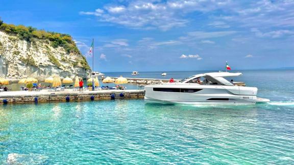 An Italy, Naples motor yacht charter lets you enjoy crystal-clear waters and breathtaking scenery on La Dolce Vita.