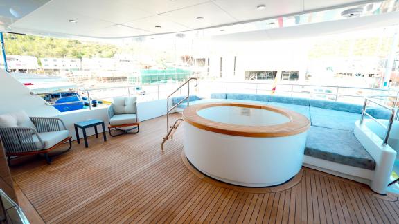 The deck of Princess Melda features a comfortable jacuzzi area.