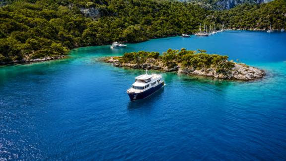 Anchored in Göcek, Beluga 1 is surrounded by islets and turquoise waters, ideal for blue cruise holidays.