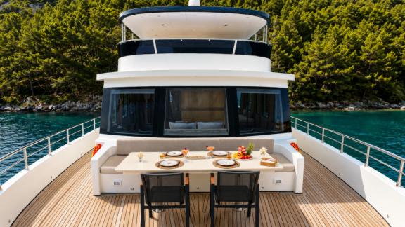 Beluga 1 in Göcek features an outdoor dining area and lounge space on the foredeck.