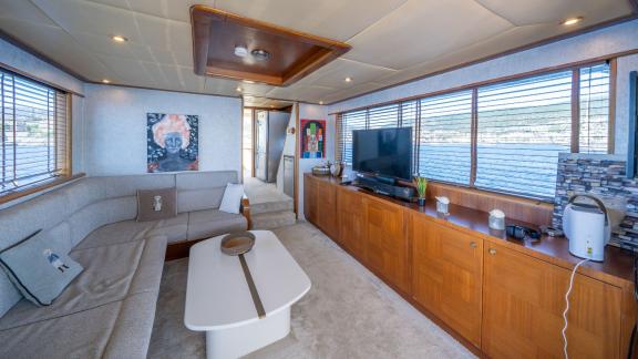 Miro 1 features a panoramic main salon for trawler charters and extended blue cruises in Göcek.