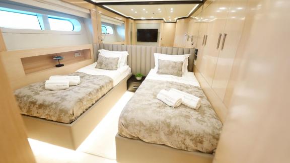 The cabin on Princess Melda yacht with twin beds features spacious and comfortable design.