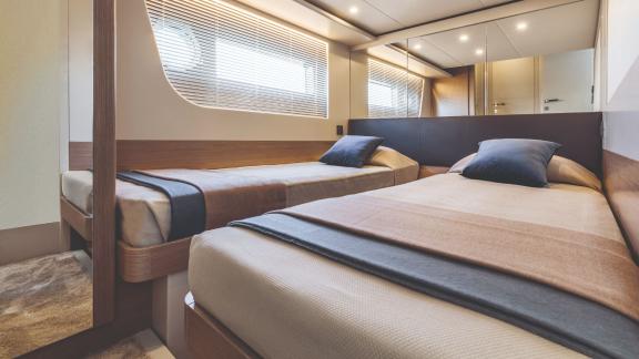 The twin bed cabin on Emilia 2 is designed in a modern and comfortable style.