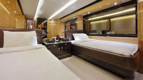 The elegant twin cabin on Code 8 yacht adds comfort to your Dubai daily yacht rental experience.