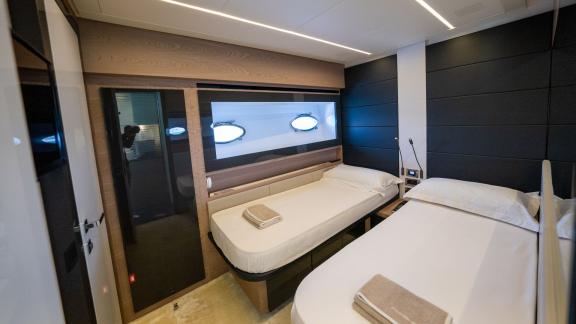 Explore the stylish and comfortable twin guest cabin on Pershing 70 with your Dubai daily yacht rental.