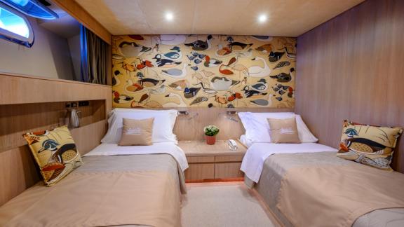 Enjoy a relaxing vacation in the twin cabin of Sandi IV with an Italy motor yacht rental.