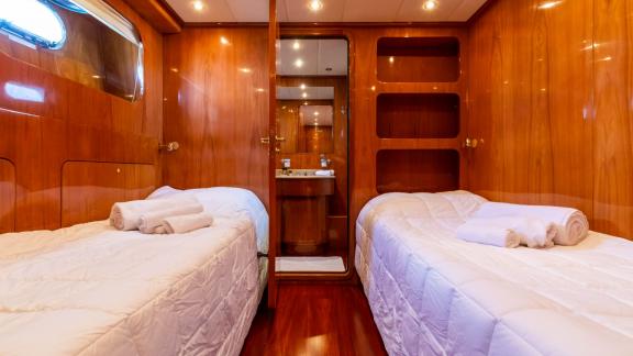 Olbia motor yacht charter ensures a relaxing stay in the stylish guest cabin of the Shangra.