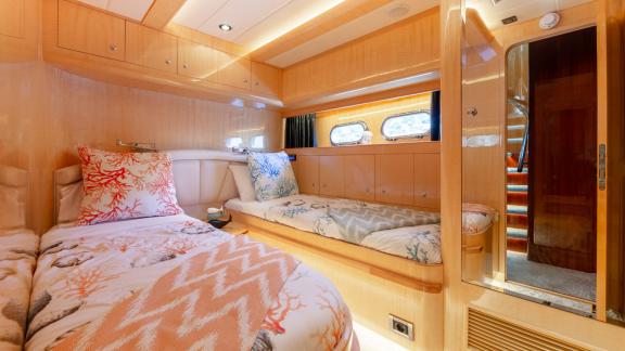 Comfortable twin-bed guest cabin aboard Ehthele yacht offering luxury near Mallorca.