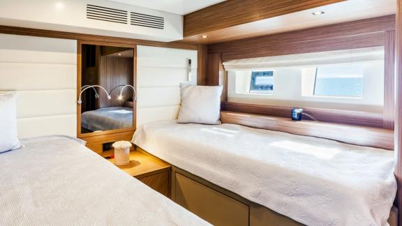 Double cabin with large windows and bright atmosphere on Sirena 64.