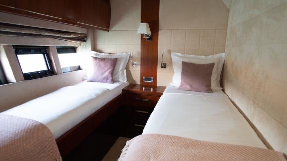 Stylish cabin with two single beds aboard motor yacht Le Chiffre, located in Šibenik.