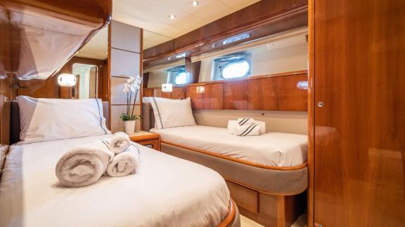 Available for charter in Athens the 4 cabin 10 guest Falcon 86 Estia Poseidon motor yacht offers a comfortable twin cabi