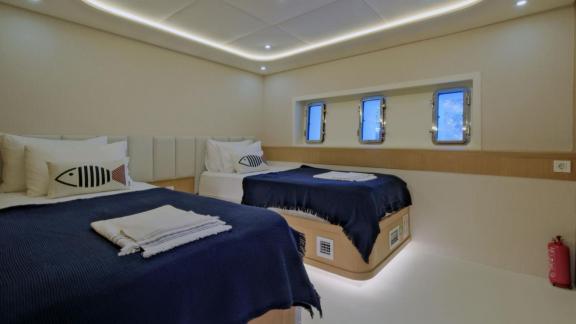 Among Fethiye luxury yacht options the 6 cabin 12 guest Dodo motorsailer features a twin guest cabin with separate beds.