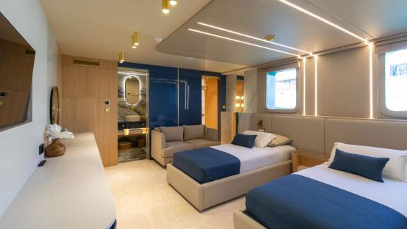 Scorpios Motorsailer features two separate beds, a seating area and an en-suite bathroom.