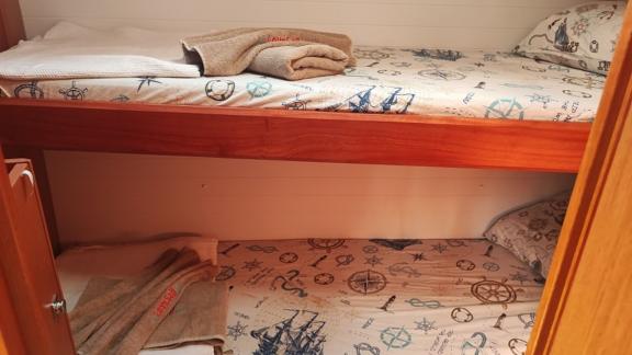 Bunk bed cabin on the Seawalker yacht, ideal for bareboat charter.