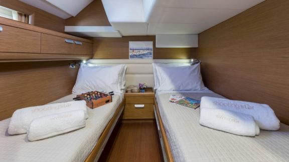 The twin bed guest cabin on the luxury yacht Shooting Star in Greece offers comfortable accommodation.