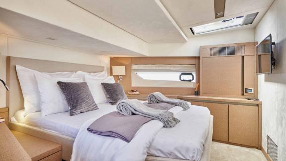 Comfortable and stylish bedroom of motor yacht Simull.