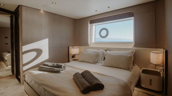 Bright and inviting cabin on the motor yacht Volante with a sea view.