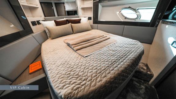 Experience unmatched comfort in the VIP cabin of Pershing 5X Grey with premium yacht rental in Dubai.