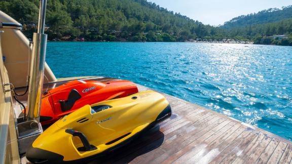 Water toys on the aft deck of motor yacht Selenge are ready for adventure.