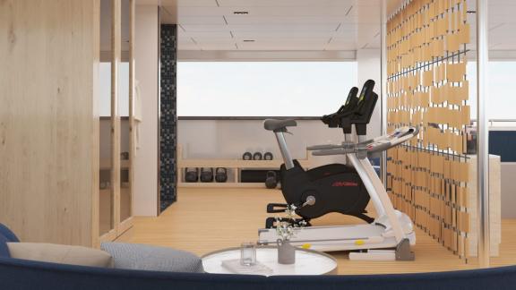 Modern fitness area for workouts on the motor yacht Alfa Mario