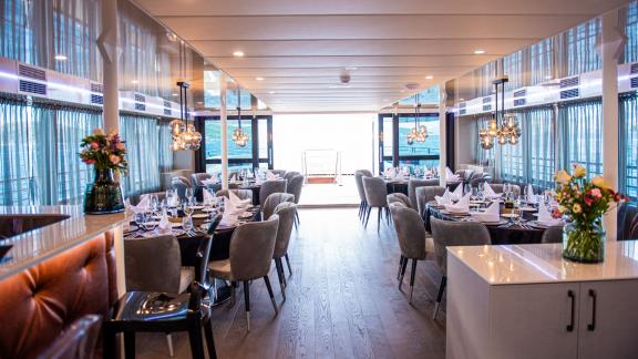 Stylishly set dining room on the motor yacht Alfa Mario