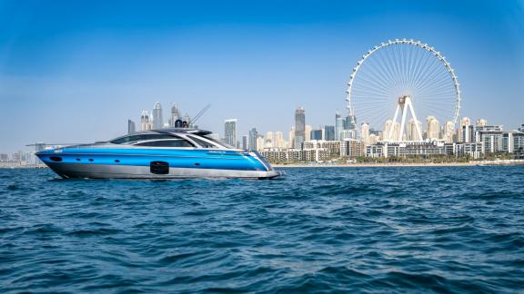 The Pershing 70, featuring a modern design and Dubai's stunning skyline, is perfect for hourly and daily yacht rentals.