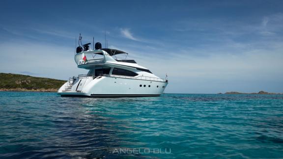 The spacious aft deck and flybridge of Angelo Blu offer a luxury yacht charter experience in Cannes.