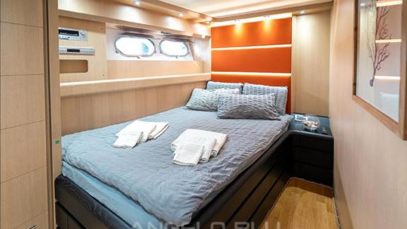 The modern guest cabin on Angelo Blu offers a comfortable yacht charter experience in Cannes.