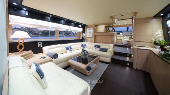 The spacious main salon on Angelo Blu offers comfortable yacht charter and sea holiday experiences in Cannes.