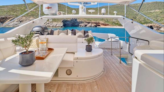 Apeiron Blue in Lavrion features an upper deck lounge with panoramic views for an exclusive yacht charter holiday.