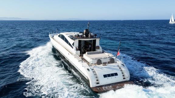 The motor yacht Aya One cruises swiftly across open seas, offering a comfortable sea journey.