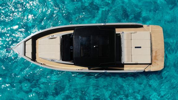 Top-down view of daily motor yacht Bambino off the coast of Ibiza.