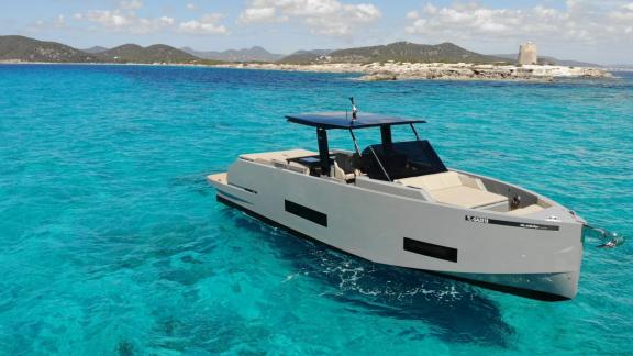 Front exterior view of daily charter yacht Bambino off Ibiza coast.